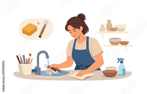 A pottery studio cleanup scene where a person carefully washes tools and wipes surfaces after finishing work in a calm creative environment with