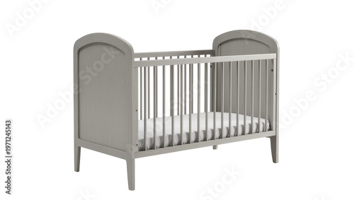 Fotografie Light gray wooden baby crib with rounded headboard and footboard
