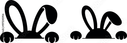 Two playful cartoon rabbits peeking out from underground burrows