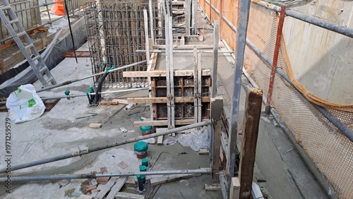 Detailed View of Concrete Formwork and Rebar Support at Construction Site
