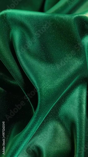 Luxurious Emerald Green Silk Fabric Draping Elegantly