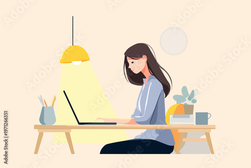 Young caucasian female working on laptop in modern office setting