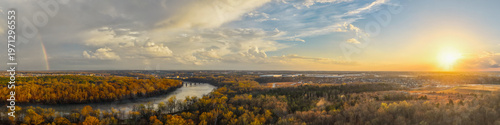 Canvas-taulu Sunset and rainbow light up the Catawba River in Rock Hill, South Carolina