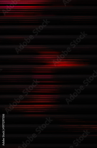 Abstract blur of lights in motion against a black background, focus on the movement