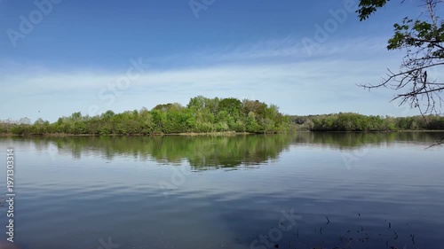 Wallpaper Mural Serene river with green trees and blue sky. Torontodigital.ca