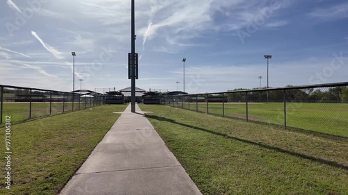 Wallpaper Mural Empty baseball field with dugouts and light poles. Torontodigital.ca