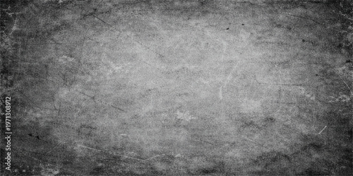 Aged dark gray concrete wall with a heavy abstract grunge texture and dirty stone pattern for an old vintage surface design