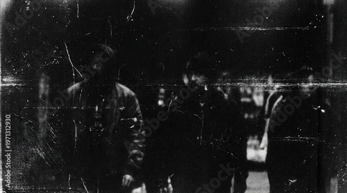 Heavy grain and coarse film scratches provide an edgy look on a deep black backdrop.