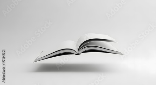 A weightless open book elegantly floats mid-air in a serene minimalist monochrome setting, symbolizing boundless knowledge, imagination, and the freedom of thought