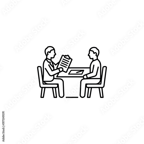 Two businessmen sitting at table.
