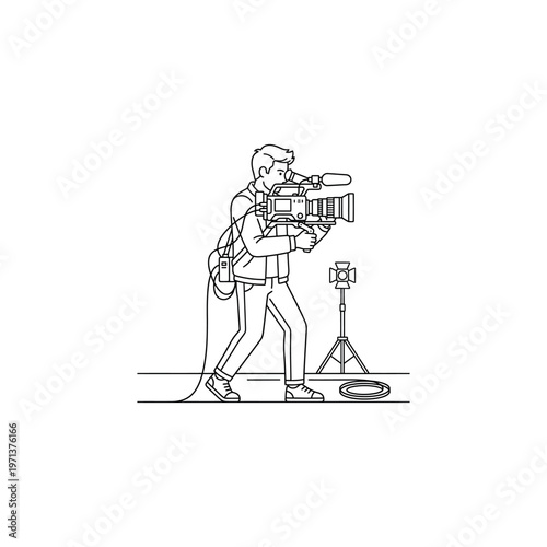 Man holding a video camera.