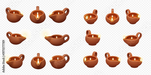 Set of traditional Indian clay oil lamps, also known as diyas, with burning wicks for Diwali festival celebration.