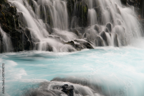 Blue glacial water pool Bruarfoss waterfall Iceland
