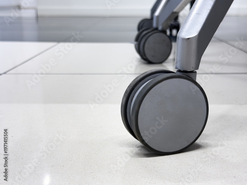 Office Chair Wheels on Clean Tile Floor