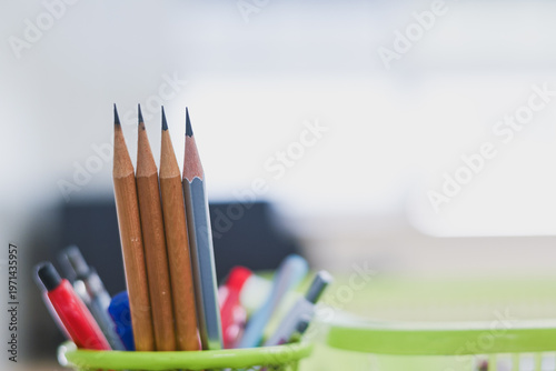 Photography Four sharpened pencils lined up side by side.