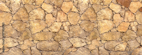 Rough stone wall texture creating a rustic background pattern