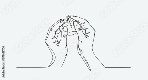 Hands clasped together in prayer.