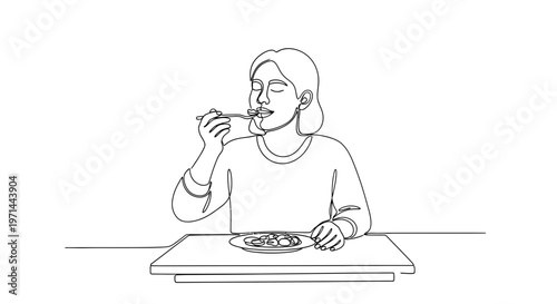 Woman eating at a table.