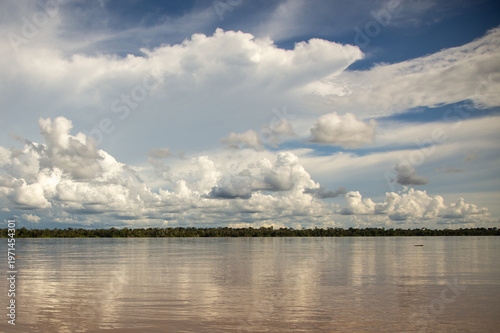 clouds over the amazon river