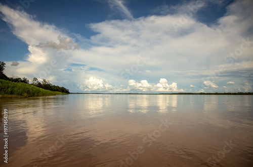 clouds over the amazon river