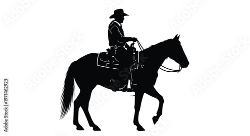Cowboy riding a horse depicted in a striking black silhouette