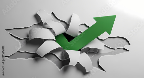 Green arrow breaking through white paper background symbolizing growth