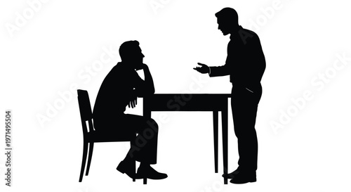 Fotografija Two men in a serious conversation one seated and one standing silhouette