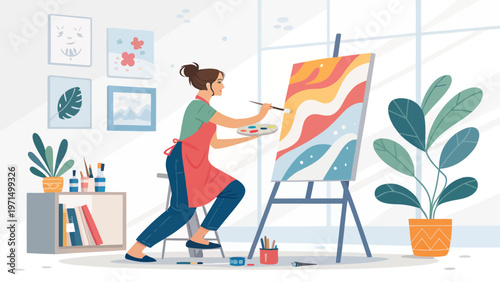 Young woman artist painting abstract art on canvas in studio with colorful brushes and plants