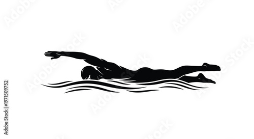 A swimmer in freestyle stroke depicted as a dark striking silhouette