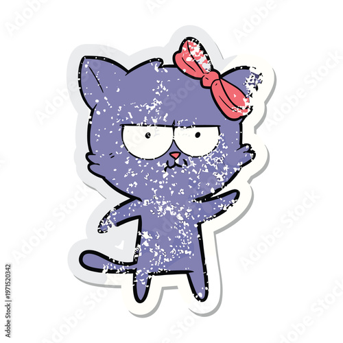 Distressed sticker of a grumpy purple cartoon cat wearing a pink bow and waving its paw