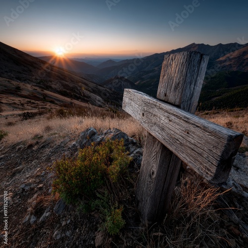 Sunset over the mountain cross, a moment of peace