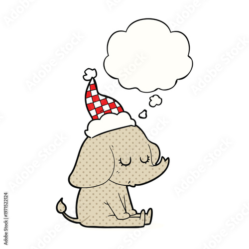 Cute cartoon elephant wearing a red and white checkered hat dreaming with a large thought bubble.