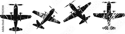 Vintage airplane silhouettes showing various top down flying positions and angles in black