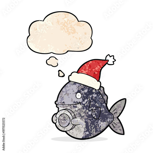 Cartoon illustration of a grey textured fish wearing a santa hat and holding a donut