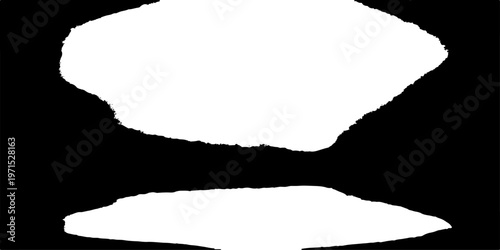 A ragged torn hole in a white paper sheet reveals an empty black grunge texture design with a rough ripped edge border on old blank cardboard