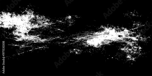 An abstract motion of black ink splats and splashes drops into a dark liquid bubble against an isolated white background to create a magic grunge effect