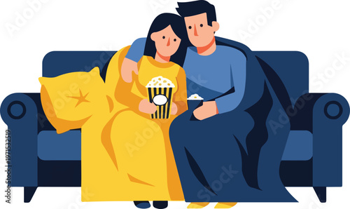 Couple under blanket with popcorn on couch watching something cozy indoor night at home.