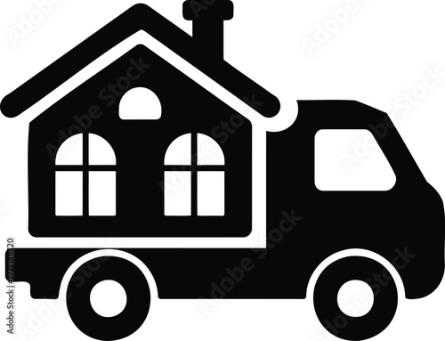 Black truck carrying a house on its back for relocation purposes easily  moving services