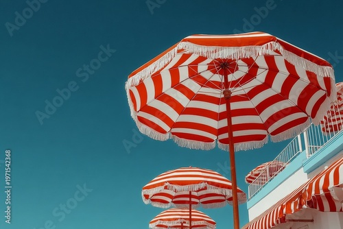 vintage inspired beach umbrellas under clear sunny sky. Generative AI