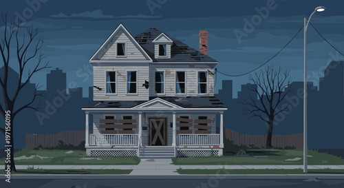 Spooky and abandoned two story wooden house with boarded up windows and peeling paint standing under a dark urban sky at night.