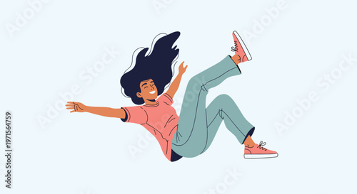 Joyful young woman with long dark hair falling backwards through the air in a state of weightless bliss against a plain background.