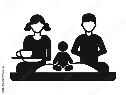 Family enjoying a quiet moment together at home with coffee and a child