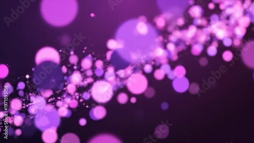 Purple bokeh light particles floating.