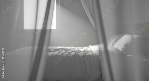 Cozy white bed framed by sheer curtains with morning sunbeam. Concept of peaceful sleep and minimalist bedroom interior.
