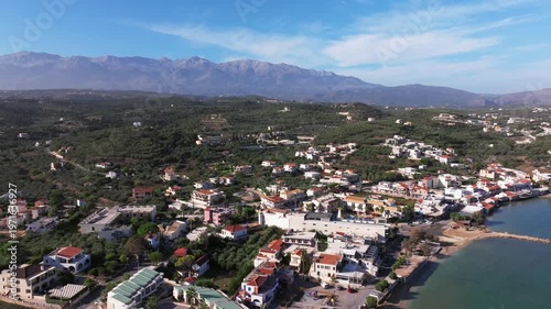 Aerial drone shot.View of famous beach in the summer, Crete, Greece. Famous beach with river and palm trees in Libyan sea. Tropical island, Panoramic view, Most beautiful beaches of Crete island