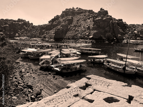 Nubian boats on the nile at Philae Temple in Aswan Egypt. Black and white