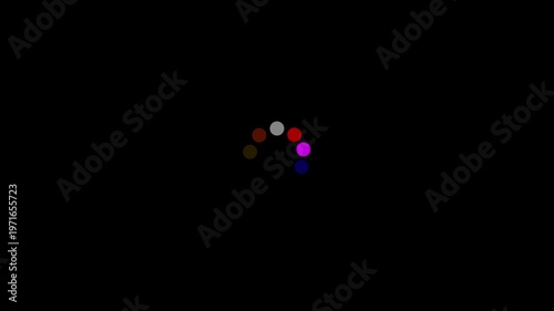 Animated loading spinner with colorful dots on a black background animation circles