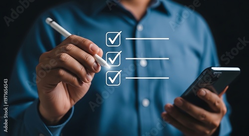 Businessman checks tasks on his phone with a pen in hand daily