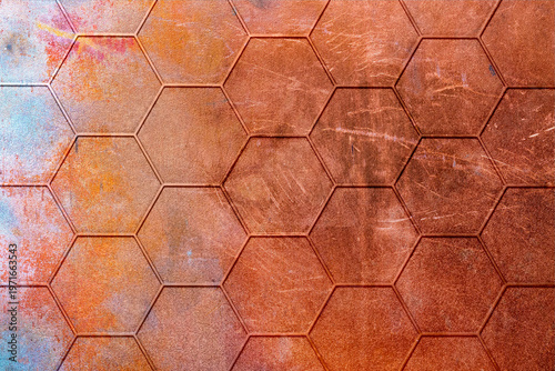 Antique copper scratched background with honeycomb pattern and coloured patina