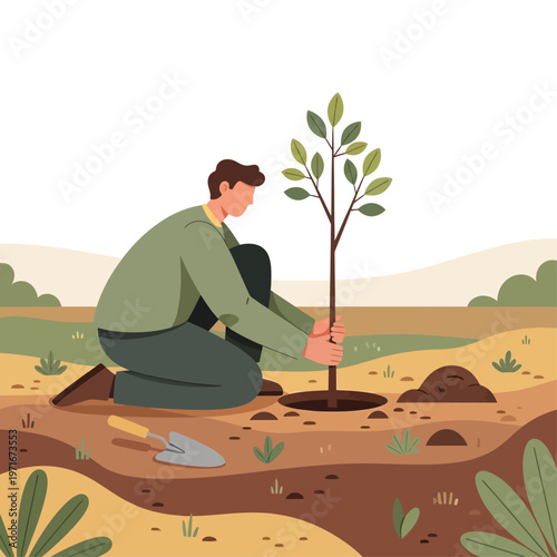 Man Planting a Small Tree Sapling.